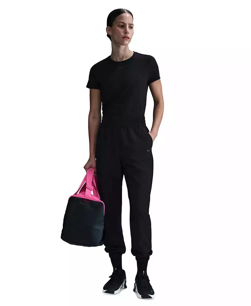 NIKE One Women's Dri-FIT Woven High-Rise 7/8 Joggers 1