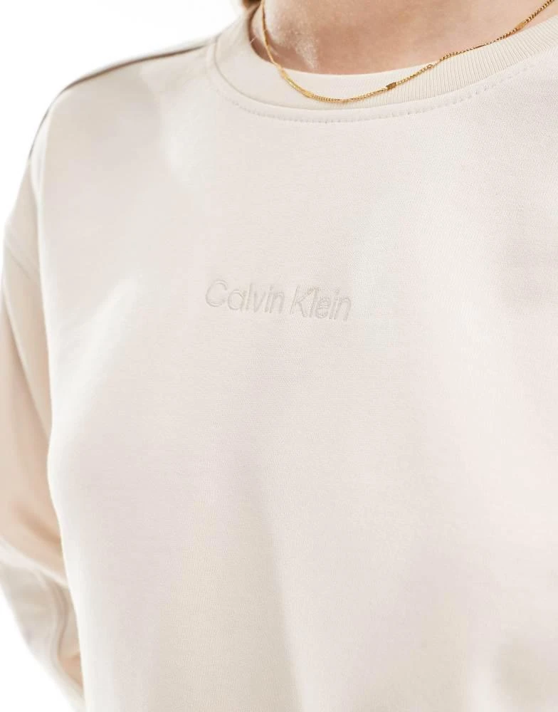 Calvin Klein Calvin Klein Tonal Logo lounge crew neck sweatshirt in cream 3