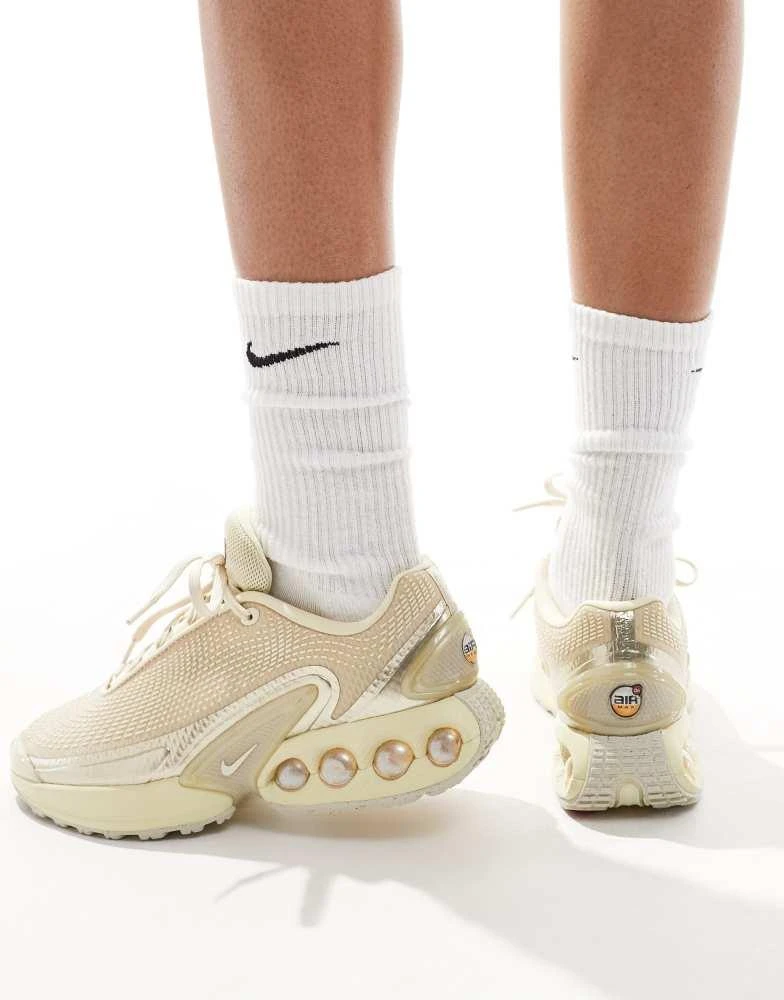 NIKE Nike Air Max DN trainers in beige and gold 5