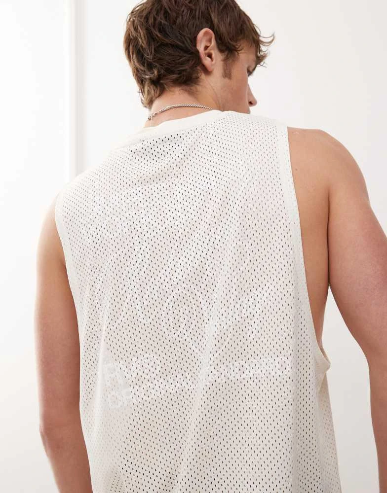 Reclaimed Vintage Reclaimed Vintage oversized dropped armhole airtex vest in white 1