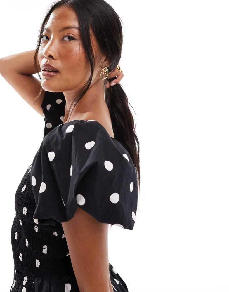 Miss Selfridge Petite bubble hem mini dress in Black polka dots-Multi Miss Selfridge Petite bubble hem mini dress in Black polka dots-Multi