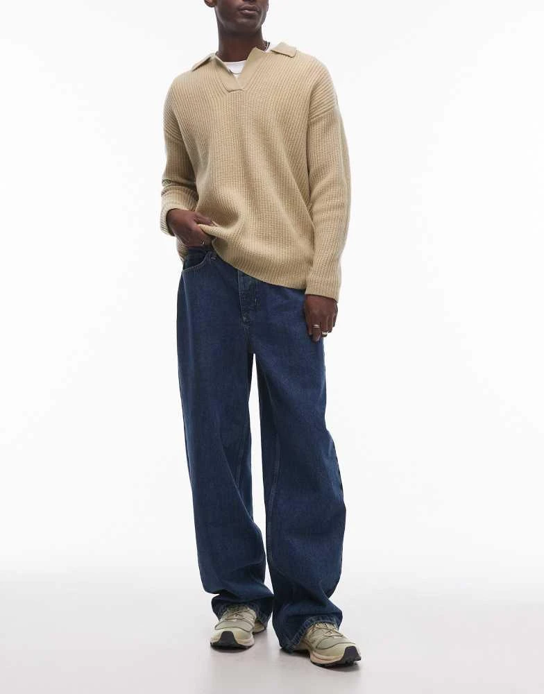 Shop Topman baggy jeans in mid wash blue on Sale at BeyondStyle