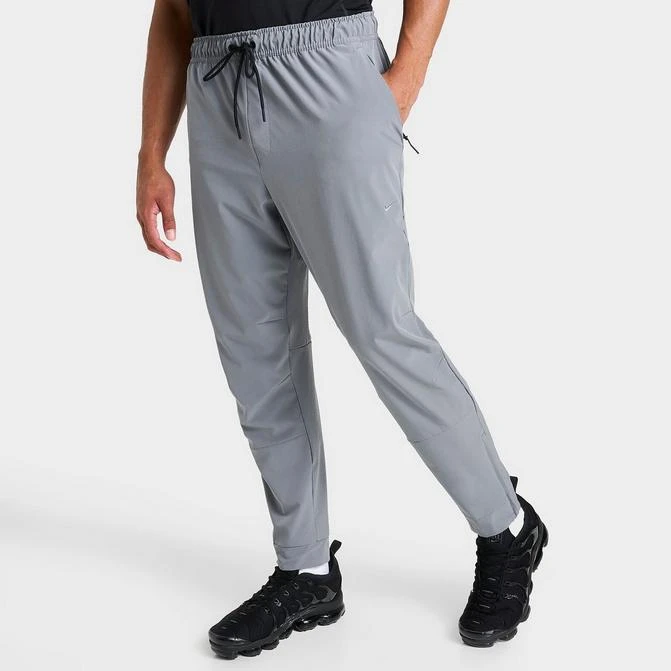 NIKE Men's Nike Dri-FIT Unlimited Tapered Leg Versatile Training Pants 1