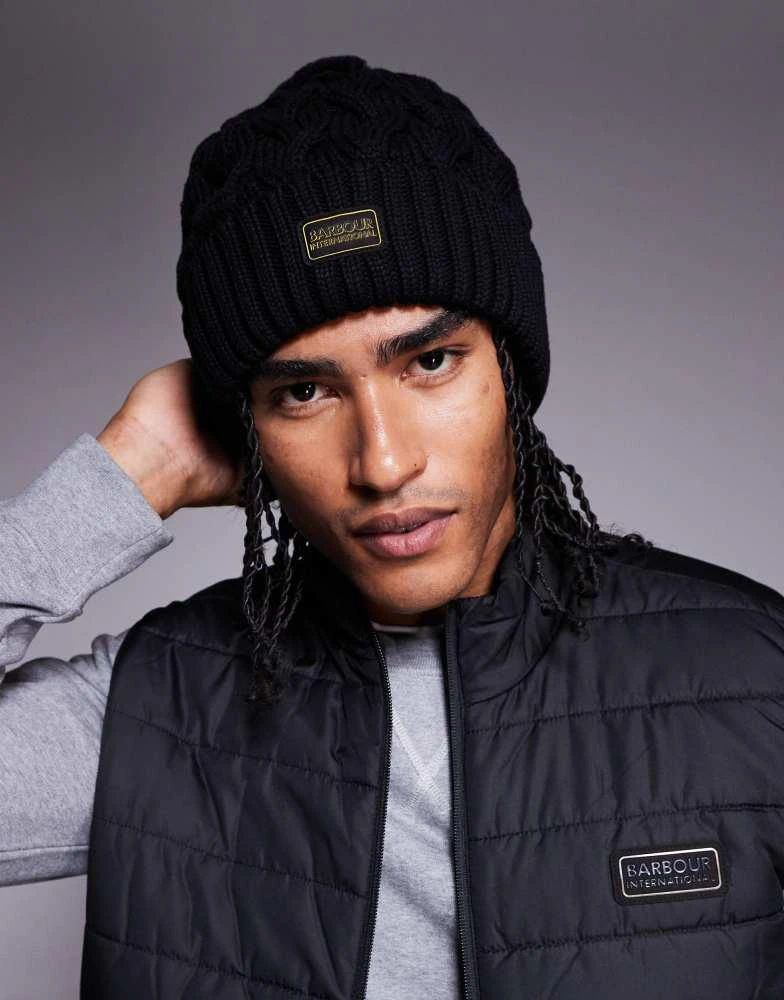 Barbour Barbour International drift cable beanie hat in black/shadow from ASOS