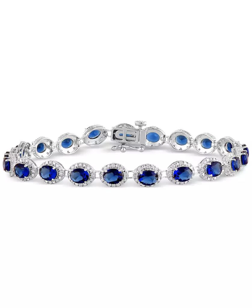 Macy
s Emerald (8 ct. t.w.)
Diamond (3/4 ct. t.w.) Halo Tennis Bracelet in 14k White Gold (Also in Ruby
Sapphire)