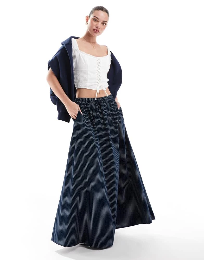 ASOS ASOS DESIGN a line tie waist midi skirt in navy stripe 1