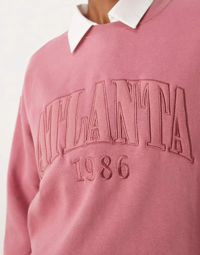 New Look New Look oversized jumper with Atlanta slogan in pink 3