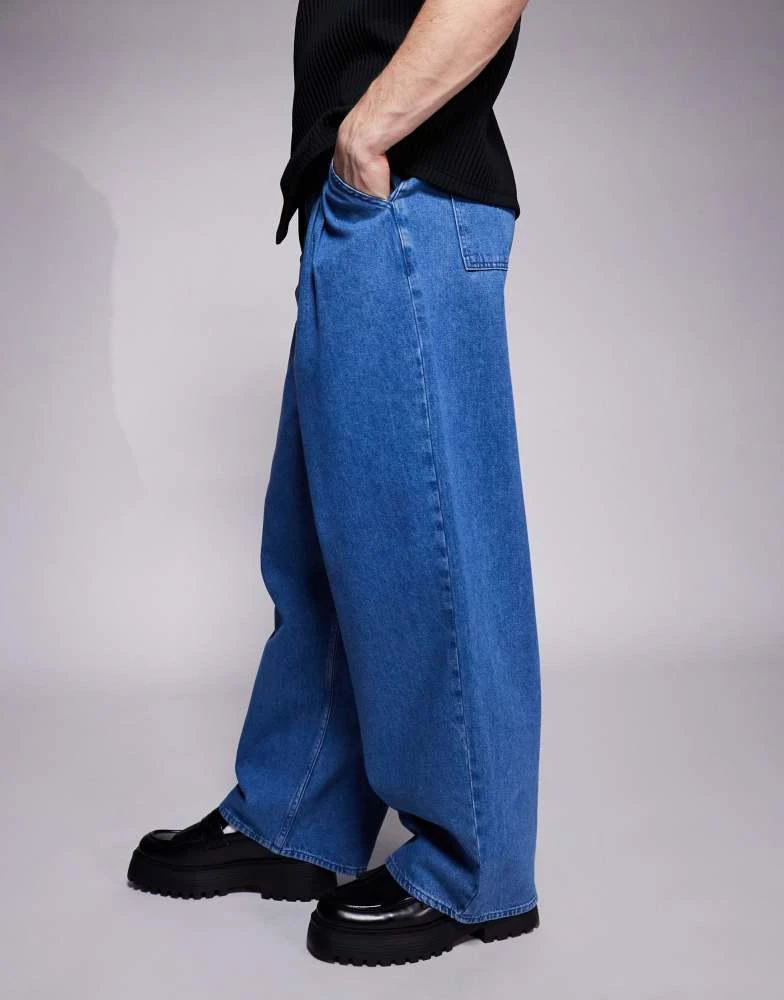 ASOS ASOS DESIGN oversized baggy jeans with side belts in mid wash blue 2