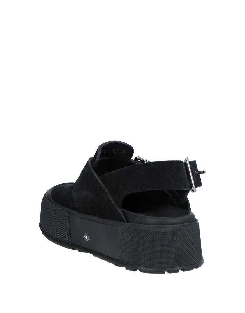 McQueen Mules and clogs 3