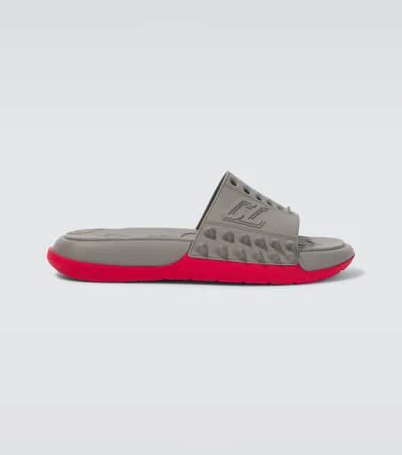 Christian Louboutin Take It Easy perforated spiked slides 1