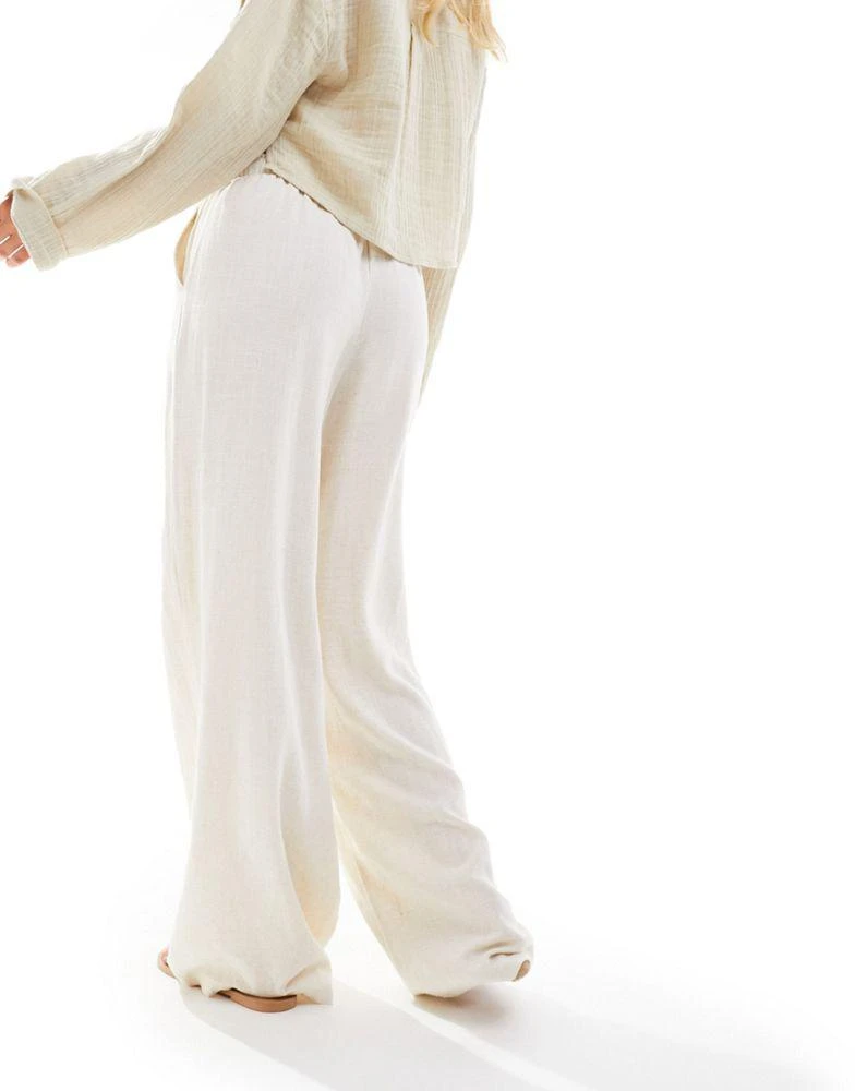 Stradivarius Stradivarius Petite linen look pull on trouser in natural 4