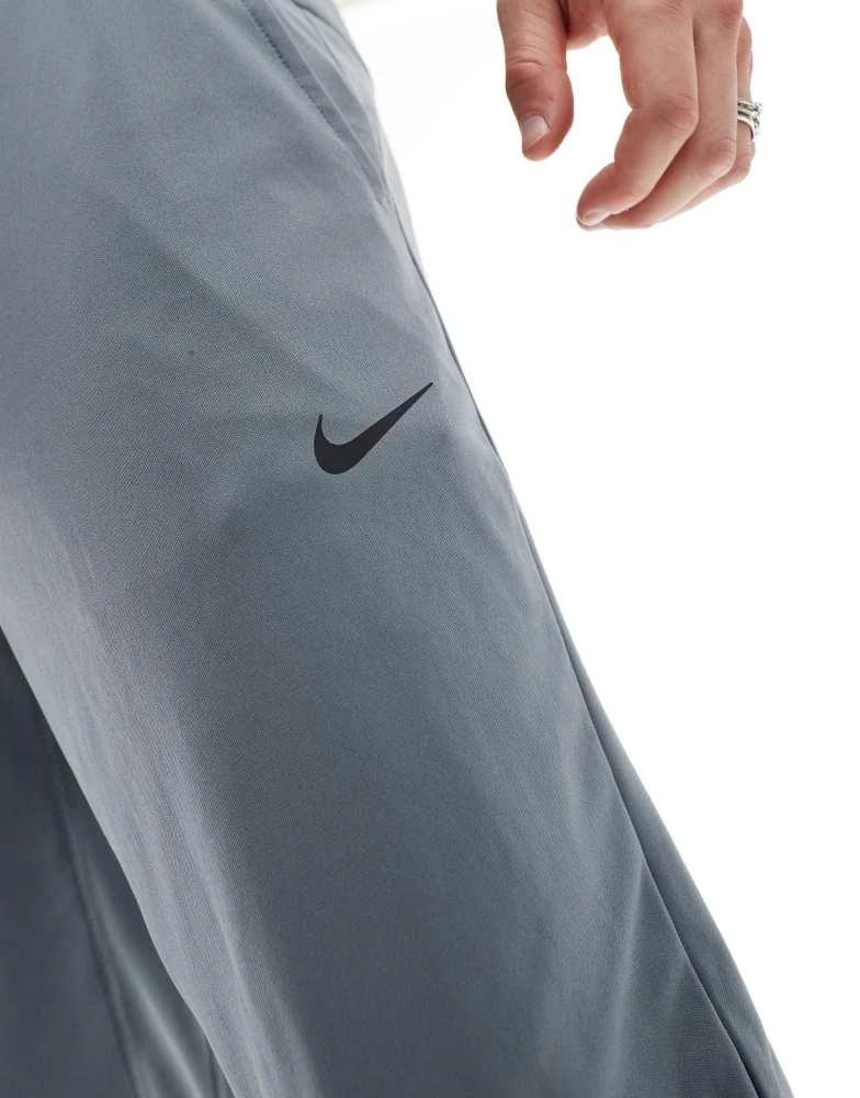 NIKE Nike Training Totality Dri-FIT tapered joggers in grey 4