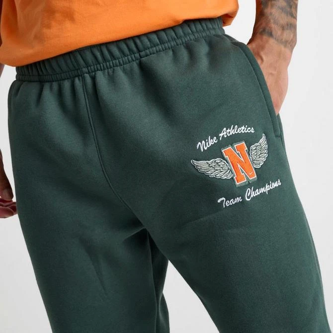 NIKE Men's Nike Club Athletics Team Champions Fleece Jogger Pants 5