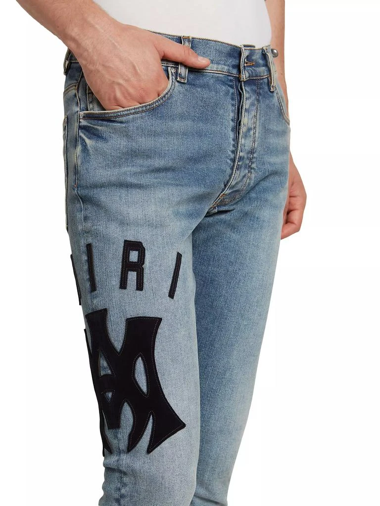 AMIRI Suede Appliqué Logo Skinny Jeans 6