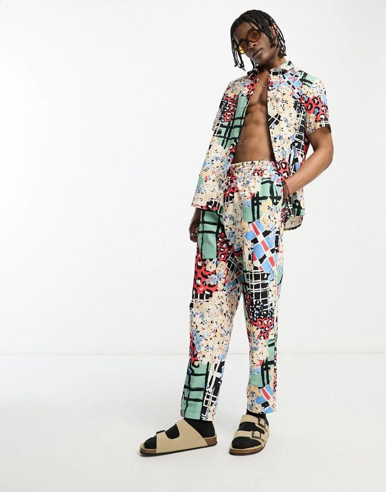 ASOS ASOS MADE IN KENYA tapered trouser in cut about graphic print 4