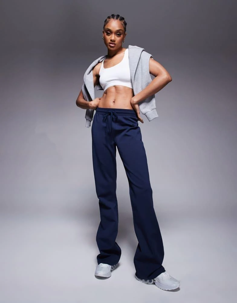 ASOS ASOS DESIGN Tall interlock flared jogger in navy 1