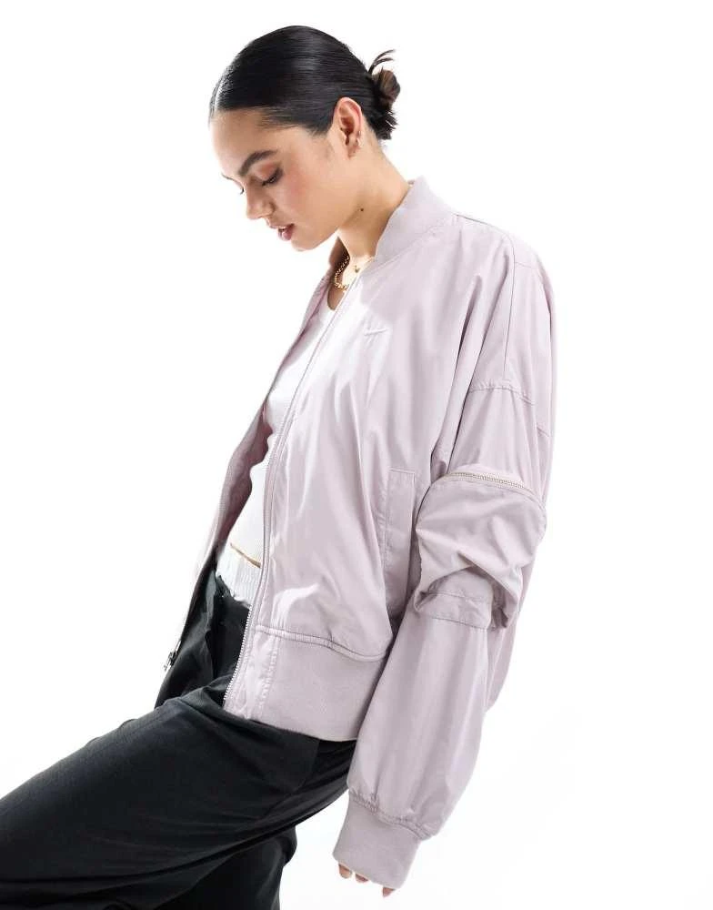 NIKE Nike essenitals oversized bomber jacket in light pink 1