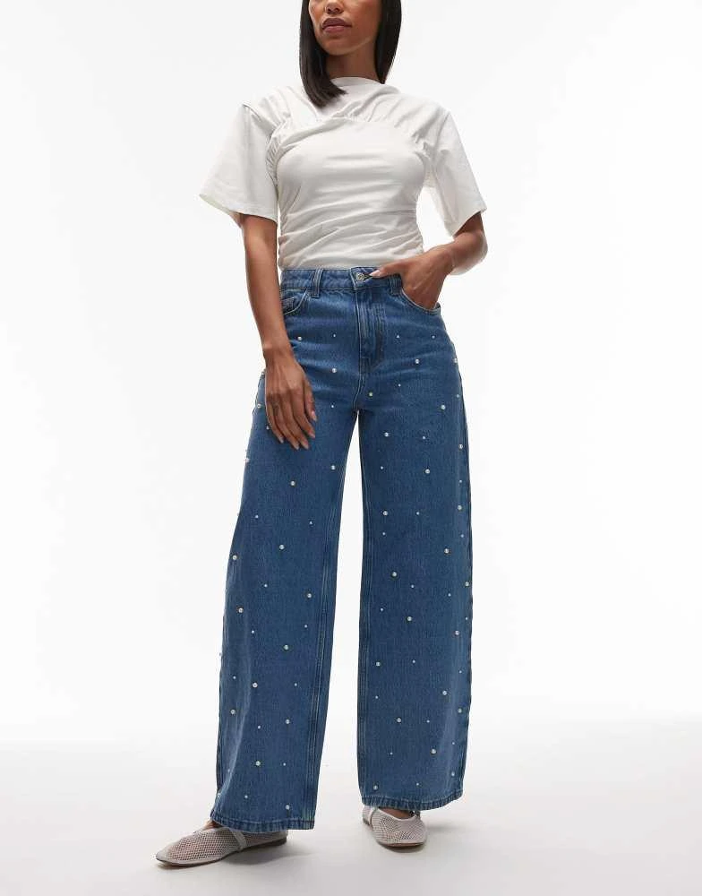 ASOS ASOS DESIGN wide leg jean with pearl detail in mid blue 1