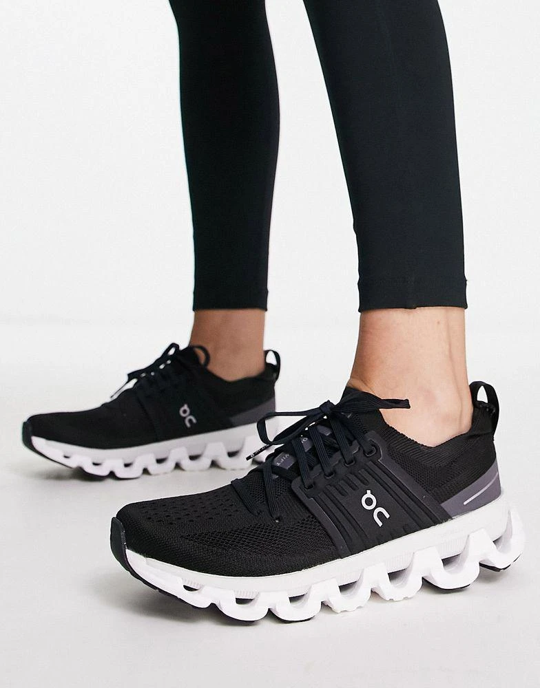 On ON Cloudswift 3 running trainers in black and white 2