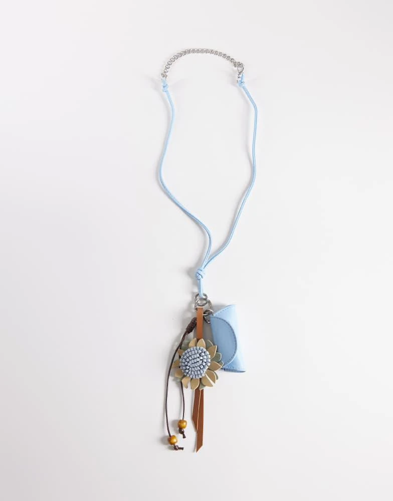 ASOS ASOS DESIGN flower and lipstick case bag charm in blue