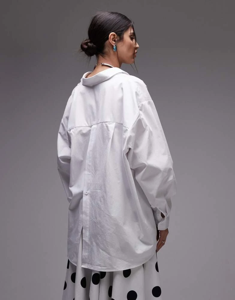 ASOS ASOS DESIGN poplin cinch detail wrap shirt in white 2