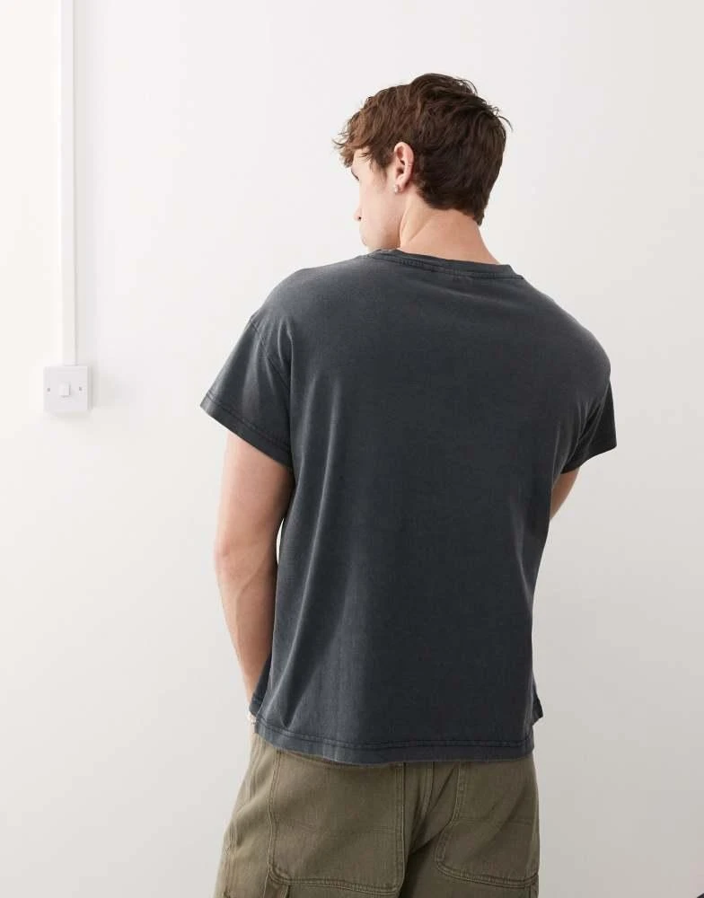 Weekday Weekday boxy fit t-shirt with cap sleeves and graphic print in washed black 4