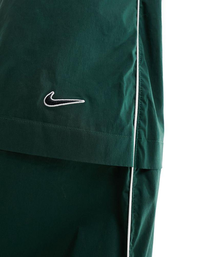Nike Nike Streetwear woven parachute skirt in dark green