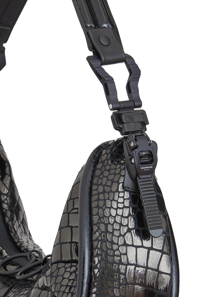 Shop Junya Watanabe X Innerraum Half Moon Embossed Shoulder Bag on