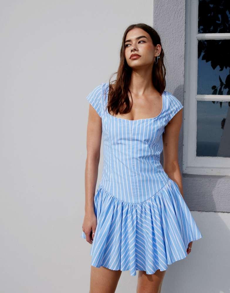 Shop Monki cap sleeve corset mini dress in blue and pink stripe on