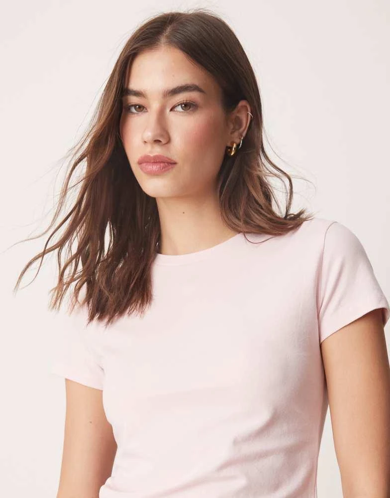 Abercrombie & Fitch Abercrombie & Fitch short sleeve seamless tuckable baby tee in pink 1