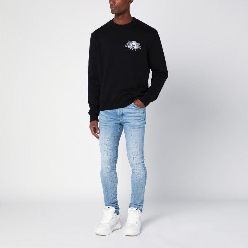 AMIRI LIGHT BLUE WASHED SKINNY JEANS WITH WEAR