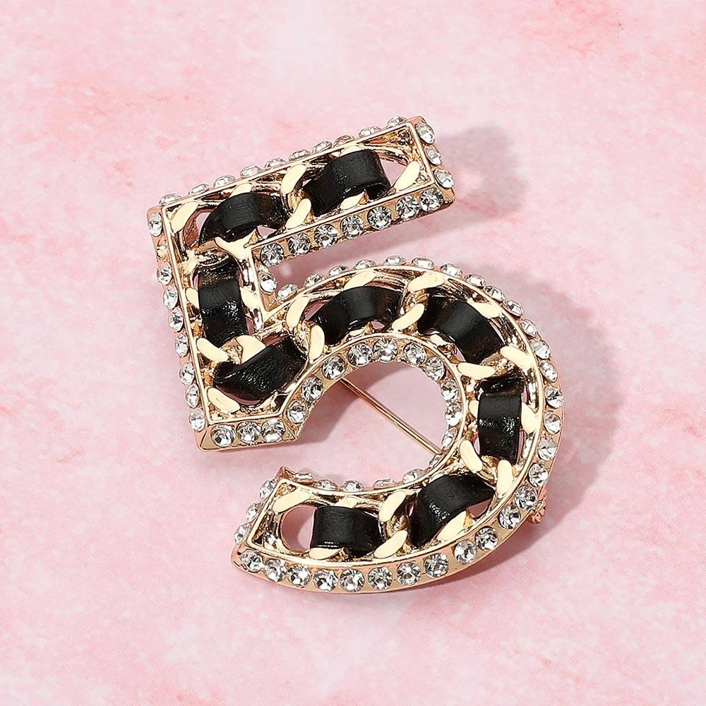 FASHNZFAB Rhinestone Rim Faux Leather Threaded Number Five Pin Brooch