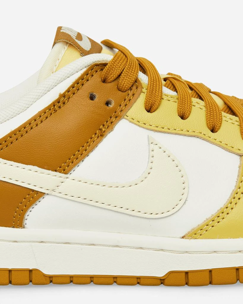 Shop Dunk Low Retro Sneakers Bronzine / Saturn Gold / Sail  display picture 1
