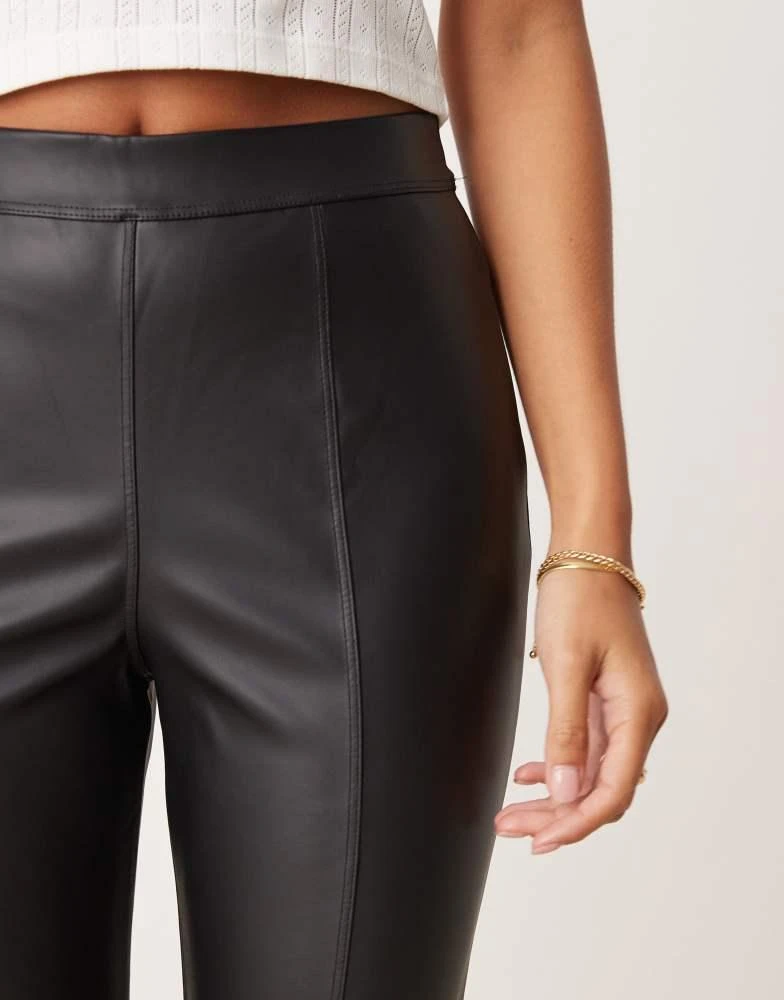 JDY Petite JDY Petite high waisted faux leather trousers in black 4