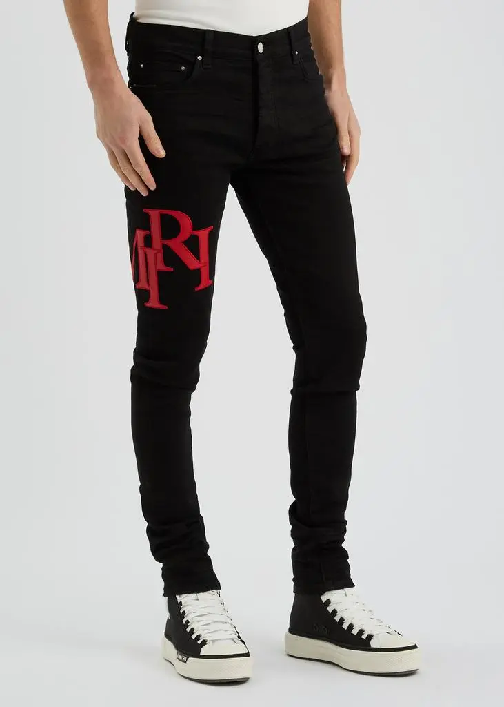 AMIRI Staggered logo skinny jeans  2