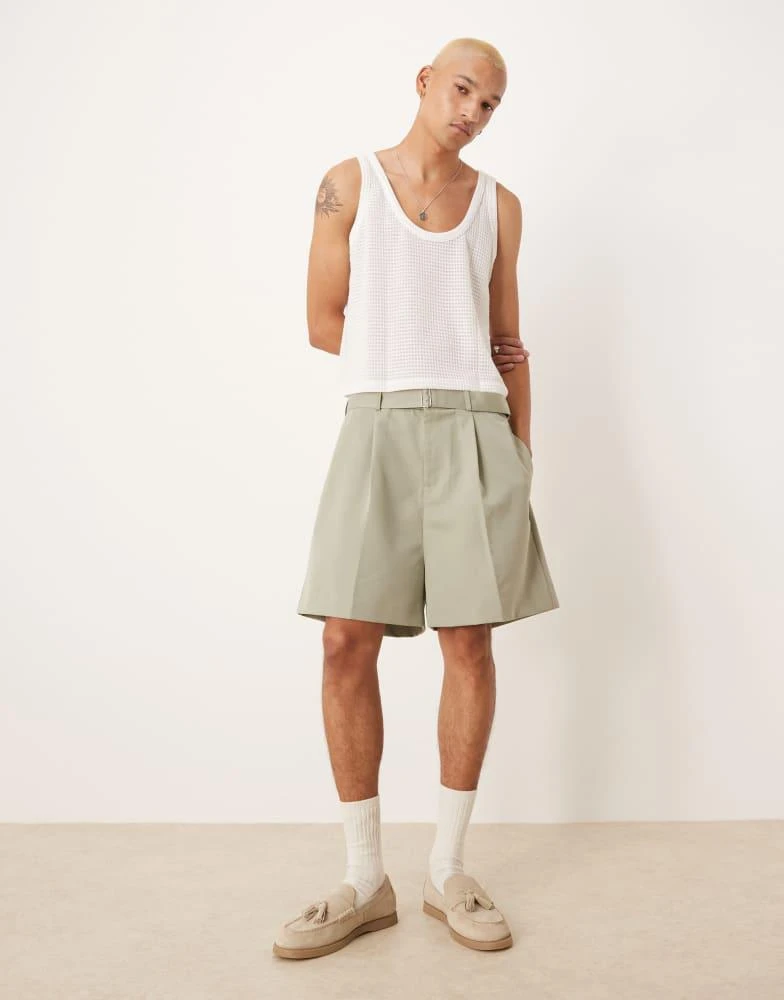 ASOS ASOS DESIGN smart bermuda shorts with front pleat and belt detail in green 1