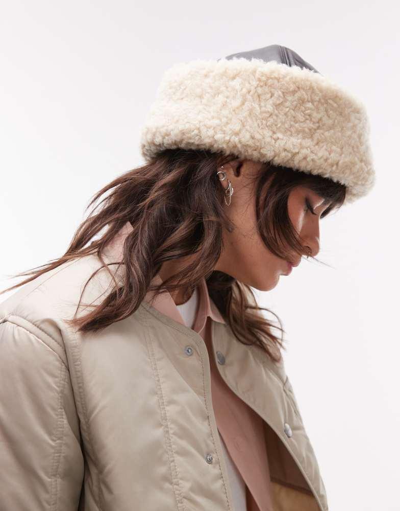 ARKET ARKET premium leather hat with faux shearling fold over lining in black and cream