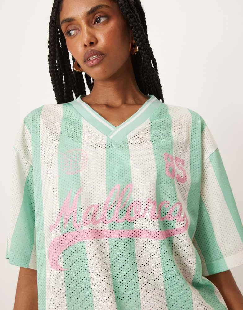 ASOS ASOS DESIGN oversized v neck football t-shirt with mallorca graphic in green stripe 3