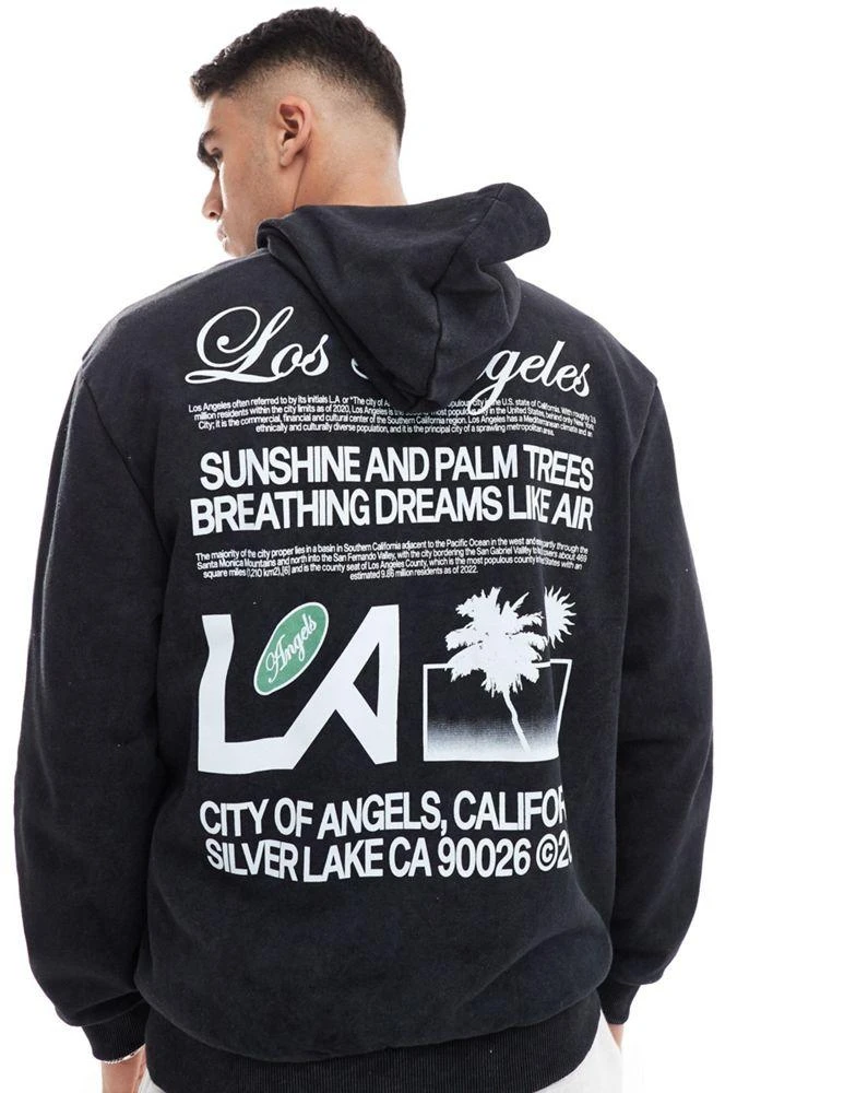 ASOS ASOS DESIGN oversized hoodie with Los Angeles text print in washed black 1