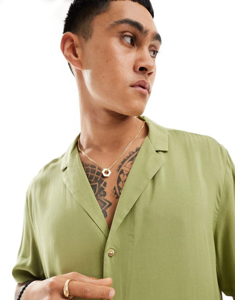 ASOS ASOS DESIGN relaxed fit viscose shirt with low revere collar in olive green 1