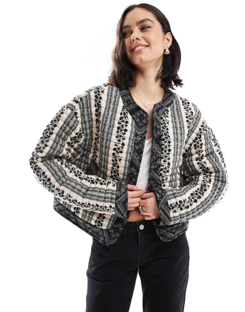 ASOS ASOS DESIGN cropped quilted jacket in patchwork in black and white floral 1