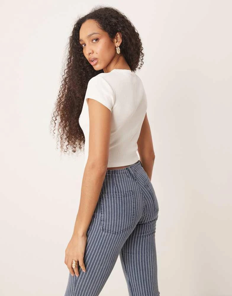 ASOS ASOS DESIGN baby tee with amsterdam location graphic in cream 3