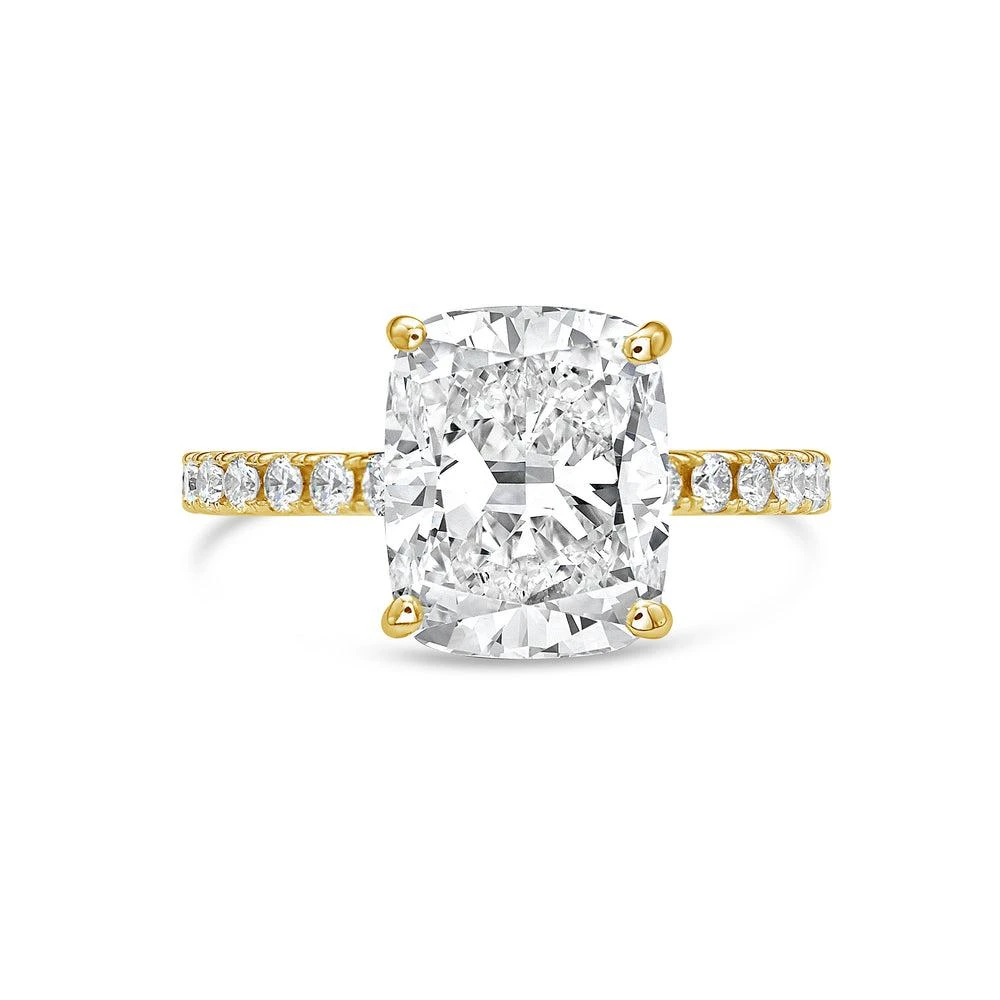 Diana M. 18kt yellow gold lab grown cushion cut with round on sides engagement ring featuring 3 ct center and 0.50 cts on the sides