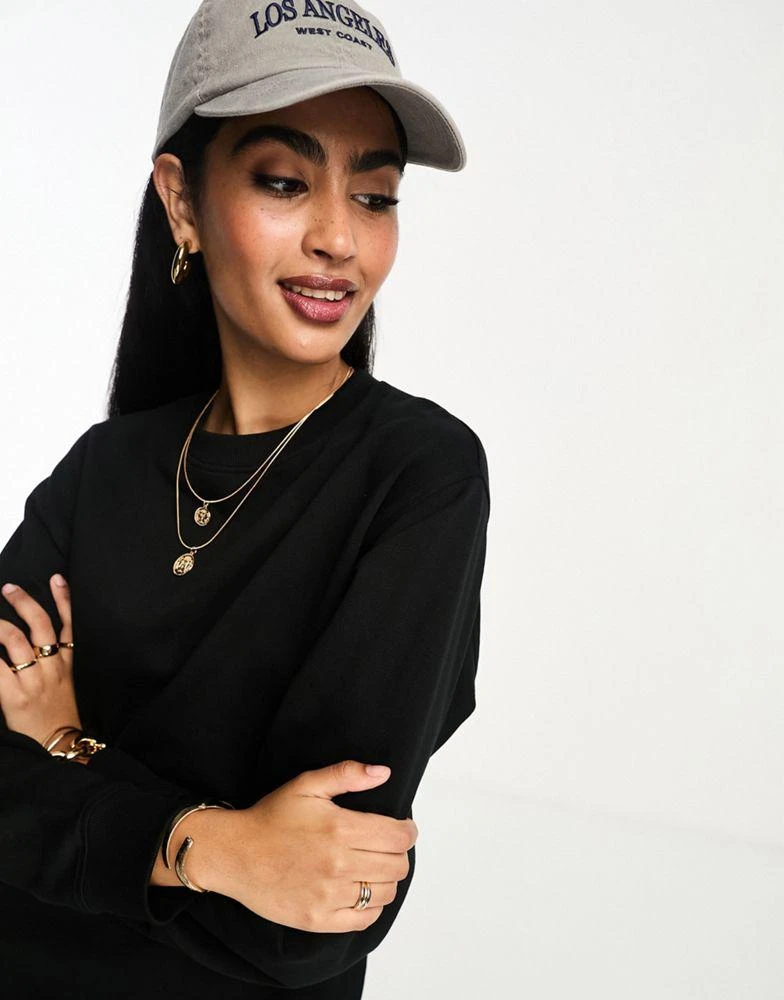 ASOS ASOS DESIGN oversized mini sweatshirt dress in black 4