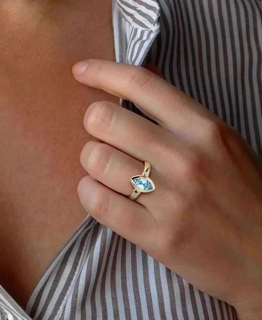 Macy
s Blue Topaz (3/4 ct. t.w.) 
Diamond (1/4 ct. t.w.) Band in 10k Gold 3