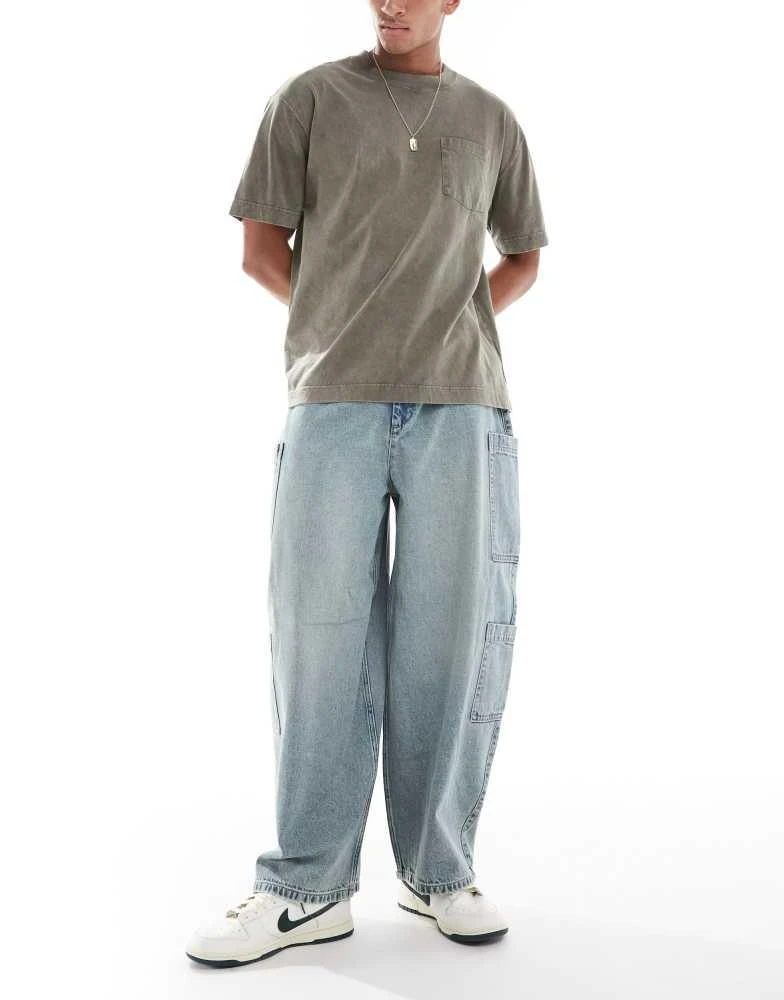 ASOS ASOS DESIGN oversized baggy jeans in bleach wash with tint and cargo pockets 1