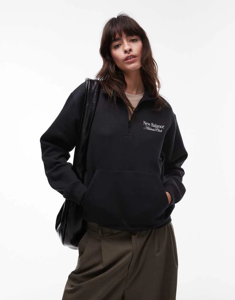 New Balance New Balance graphic half zip hoodie in black 1