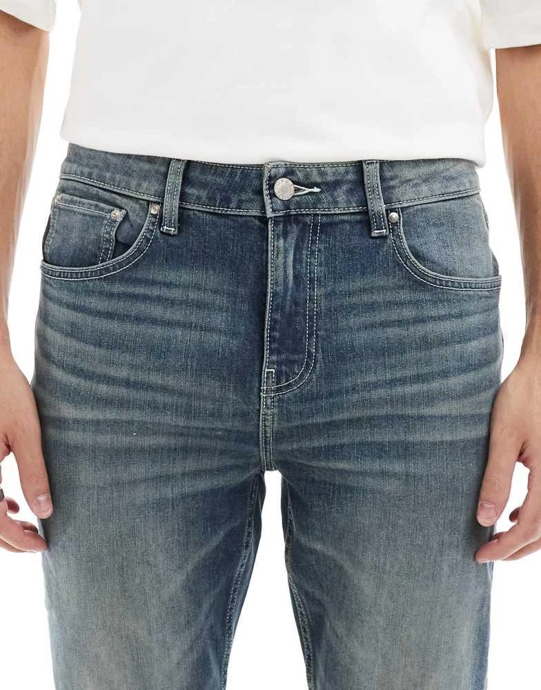 ASOS ASOS DESIGN skinny jeans with green tint in light wash blue 5