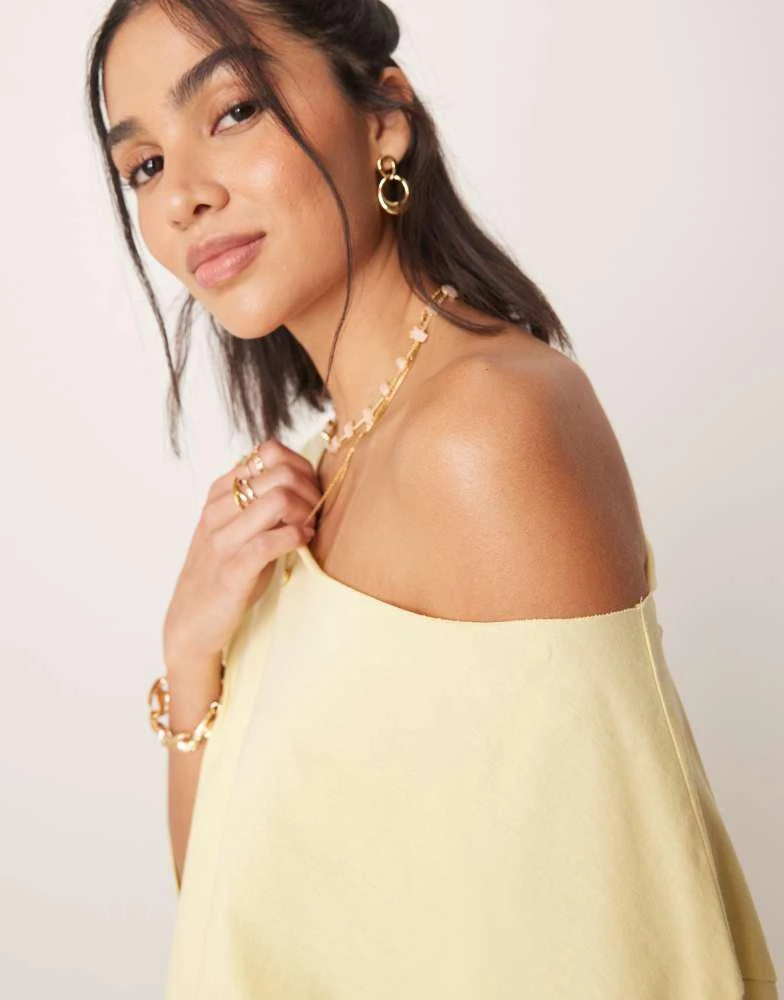 ASOS ASOS DESIGN slouchy off shoulder oversized tee in buttermilk 2