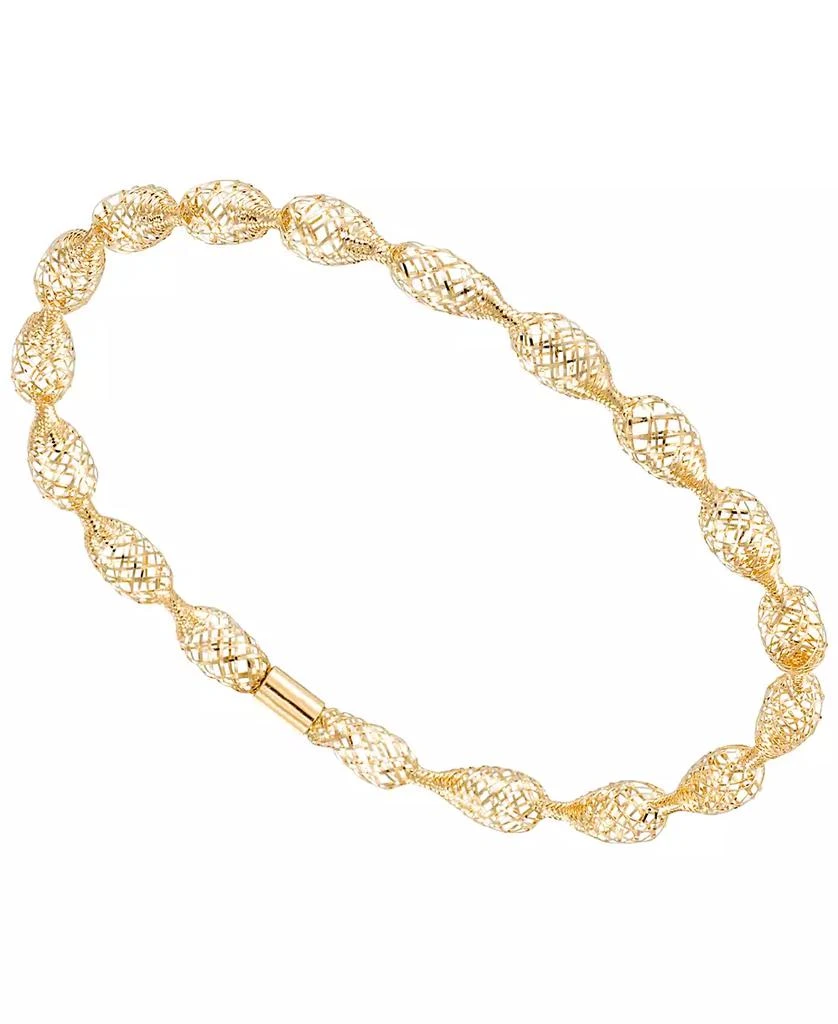 Macy
s Flexible Open Work Stretch Oval Bracelet in 10k Yellow Gold